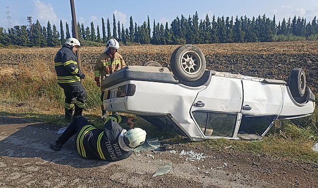 Takla atarak ters dönen otomobildeki 2 kişi yaralandı