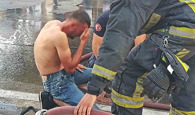 Üzerine döktüğü benzin gözlerinden ediyordu