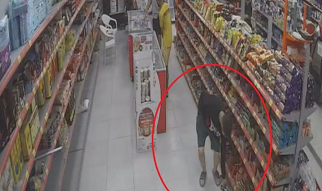 Yaptığıyla şaşırtan hırsız, 100 TL'lik enerji içeceği ve bisküvi çaldı: O anlar kamerada