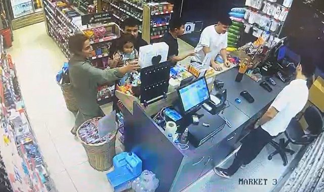 Benzin istasyonundaki bin 500 lira değerindeki oyuncağı çocuğuna çaldırdı