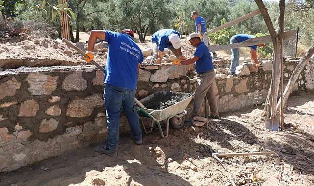 Çamlıdere'de köy içi yollar ve okul çevre duvarları yenilendi