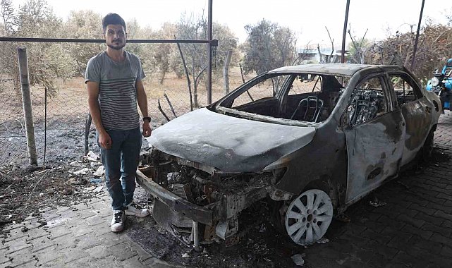 Otluk alanda çıkıp samanlığa sıçrayan yangında, tarım aletleri ve otomobilleri yanan depremzede ailenin emekleri kül oldu