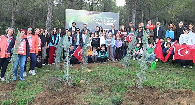 Burhaniye'de 400 fidan toprakla buluştu