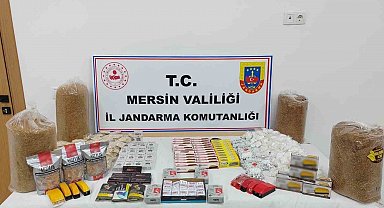 Mersin'de kaçak tütün ve 65 adet sigara sarma makinesi ele geçirildi