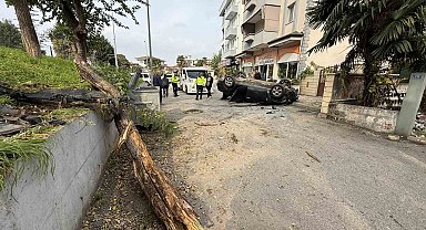Taklalar atarak hurdaya dönen otomobilden burnu kanamadan çıktı