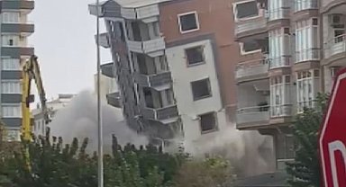 Ağır hasarlı bina yıkım sırasında korna sesiyle yerle bir oldu, facianın eşiğinden dönüldü