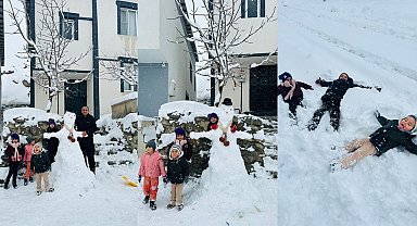 Hakkarili çocukların kardan adam sevinci