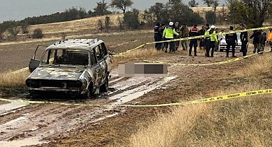Isparta'da dağlık alanda yanmış aracın kenarında başsız erkek cesedi bulundu