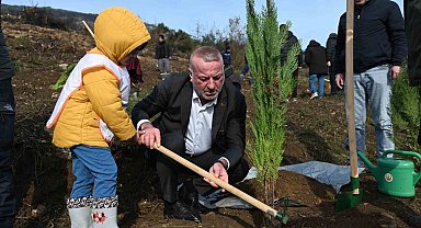 Karacabey'de yangın sonrası ilk fidanlar toprakla buluştu