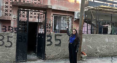 Kargoyu aracından inmeden bahçeye fırlattı