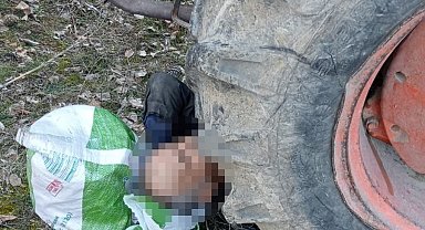 Kontrol etmek istediği traktörünün altında kalan yaşlı adam yaralandı