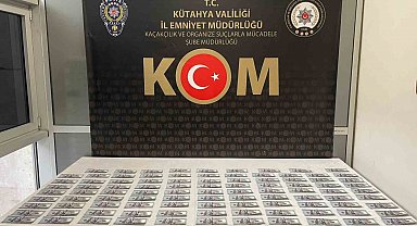 Kütahya'da KOM ekipleri sahte para operasyonunda kalpazanı yakaladı