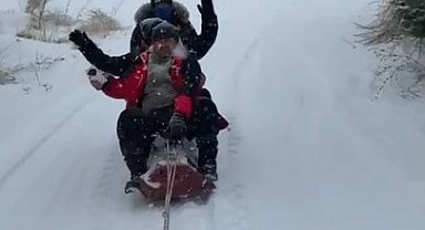 Malatya'da traktör arkasında karda 'sörf'