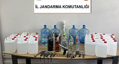 Milas'ta sahte içki ve silah ele geçirildi