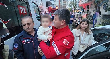 Otomobilde unutulan bebek kurtarıldı