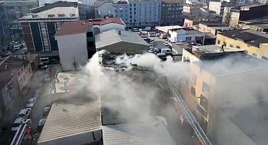 Sultangazi'de bir binada çıkan yangında can pazarı: Alevlerin arasından atladı