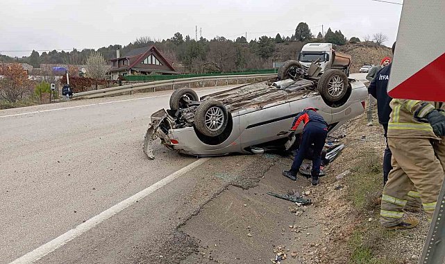 Takla atan otomobilden yara almadan kurtuldu