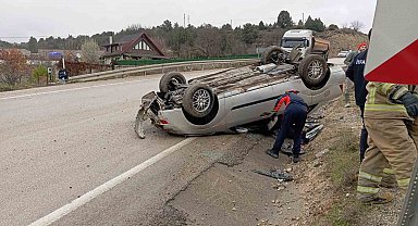 Takla atan otomobilden yara almadan kurtuldu