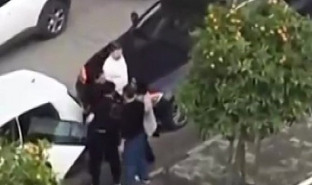 Adana'da koca eşini tartaklayıp, otomobiliyle aracına defalarca vurdu