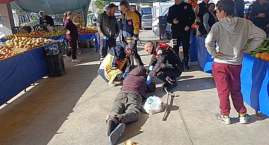 Alkolün etkisiyle pazaryerinde sızdı, vatandaşlar uyandıramayınca polis ve sağlık ekipleri müdahale etti