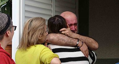 Evleri yanan genç kızı anne ve babası sarılarak teselli etti