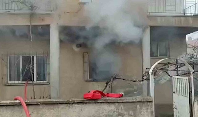 İtfaiyeci gaz sızdıran tüpü eliyle taşıyarak facianın önüne geçti