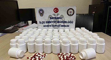 İzmir'de mezarlıkta poşet içerisinden binlerce uyuşturucu hap çıktı