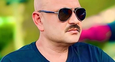 Mezarlıkta ağaca asılı halde bulundu