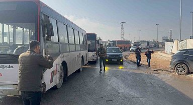 Suriye'de Şeyh Maksud Mahallesine gelen 20 otobüs, teslim olan SDG'li teröristleri farklı bölgelere götürecek