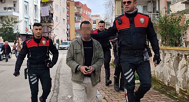 Apartman bahçesine sakladığı pompalı tüfek polisi alarma geçirdi