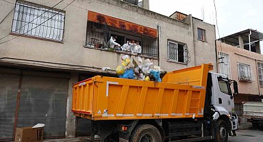 Çöp evden 115 bin lira ve ruhsatsız silah çıktı