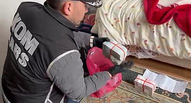 Kars'ta tefecilik operasyonu: Yatağın altından poşet poşet para çıktı