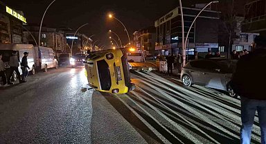 Sıkışan trafikte kontrolden çıkan taksi yan yattı