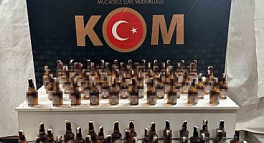 Şüphe üzerine aranan araçta 100 şişe kaçak alkol ele geçirildi