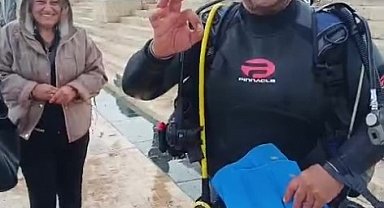 Denize düşen evlilik yüzüğünü dalgıçlar çıkardı