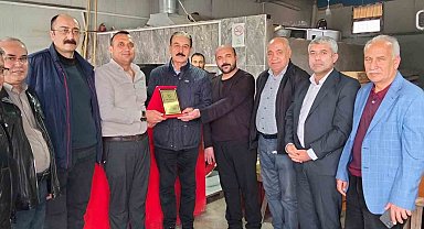 Fazla yardımı kabul etmeyen esnafa örnek davranış plaketi