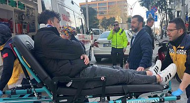 Otomobile çarpmamak isterken düşen motosiklet sürücüsü yaralandı