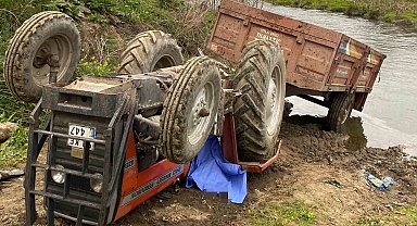 Toprak yolda devrilen traktörün altında kalan sürücü hayatını kaybetti
