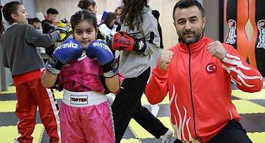 Akran zorbalığından korumak istediği kızını şampiyon yaptı