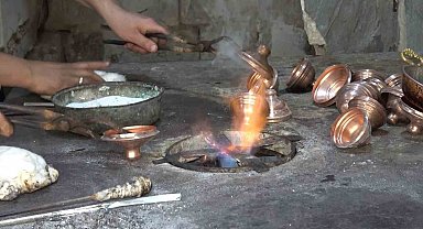 İkiz kardeşler baba mesleğini yaşatıyor