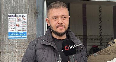 Sel sularında mahsur kalan anne kedi ve yavrularını esnaf kurtardı