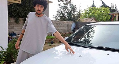 Sesle panik ve korku yaşayan vatandaşın aracına yorgun mermi isabet etti