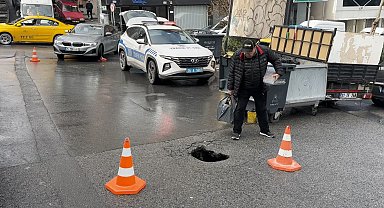 Şişli'de sağanak yağış nedeniyle yol çöktü