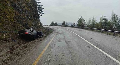 Takla atan otomobilden yara almadan kurtuldu