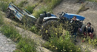 Turgutlu'da ön lastiği fırlayan traktör takla attı: 2 yaralı