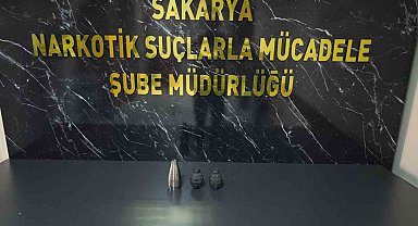 Uyuşturucu baskınında evden el bombası ve havan topu gövdesi çıktı