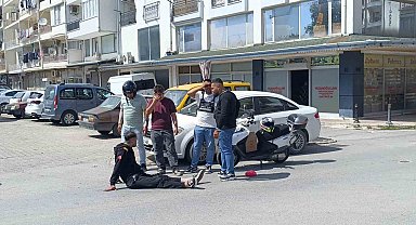 Bisikletli çocuğa çarpmamak için motosikletini devirip yaralandı