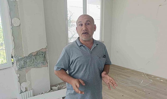 Çatlaklardan ışık görülen apartmanda korku dolu yaşam