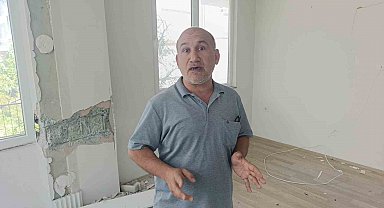 Çatlaklardan ışık görülen apartmanda korku dolu yaşam