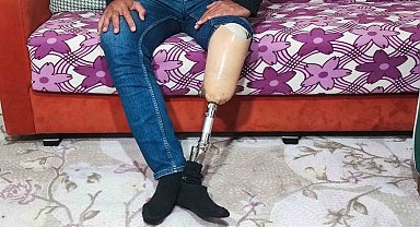 Protez bacaklı adam alacağını almak için IBAN verdi, cezaevine girip işinden oldu